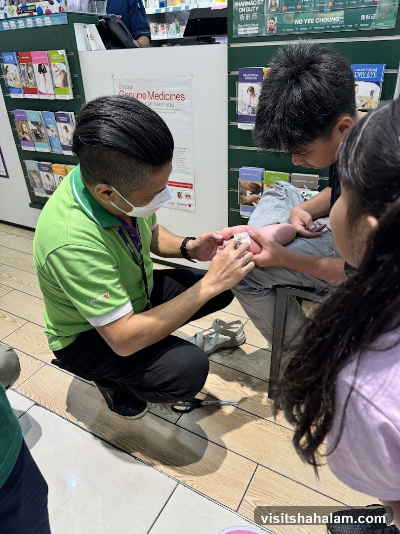 Pharmacist assisting a child