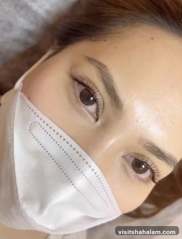 Close-up of a woman's eyes with a mask