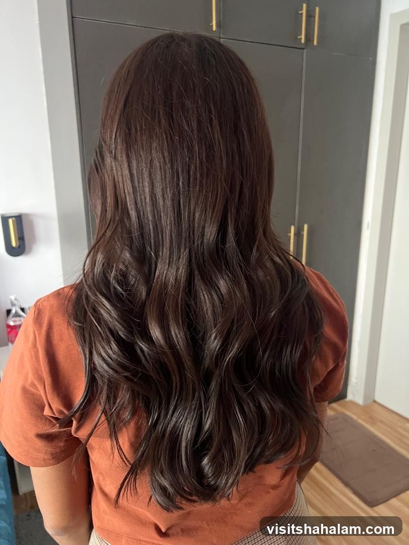 Woman with long, wavy brown hair