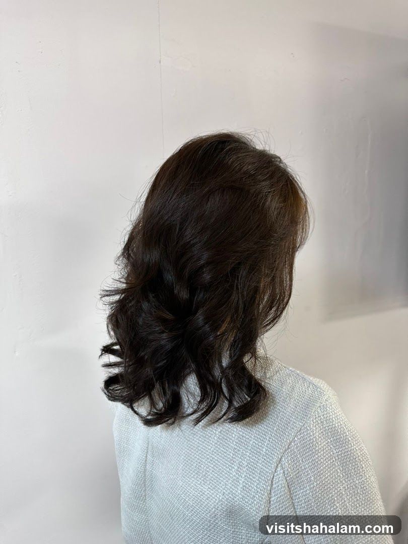 Woman with styled dark hair