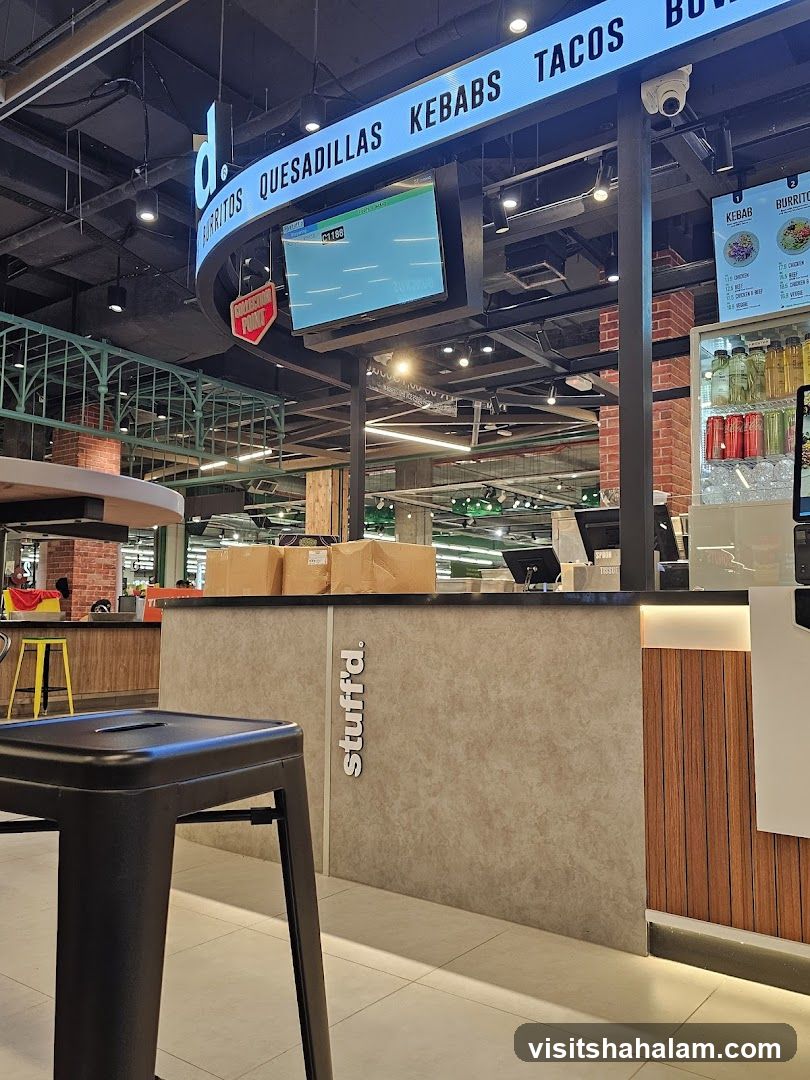 Food counter with menu and seating