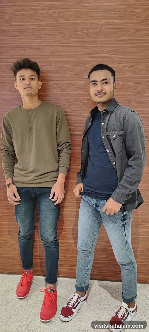 Two young men posing for a photo