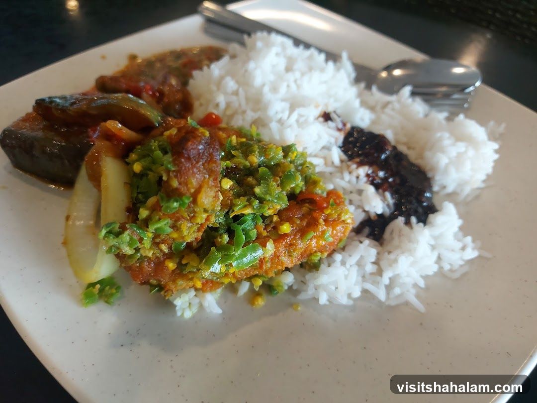 Plate of Rice with Various Toppings
