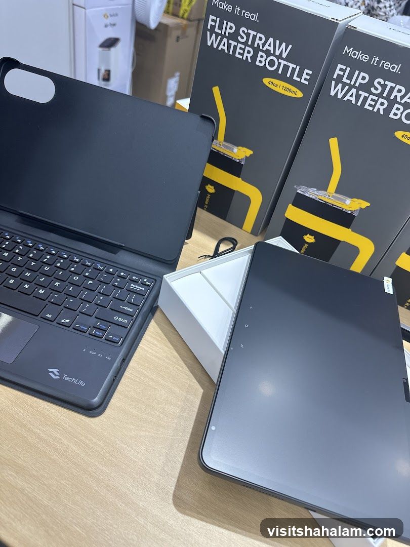 Tablet and Keyboard with Water Bottle Packaging