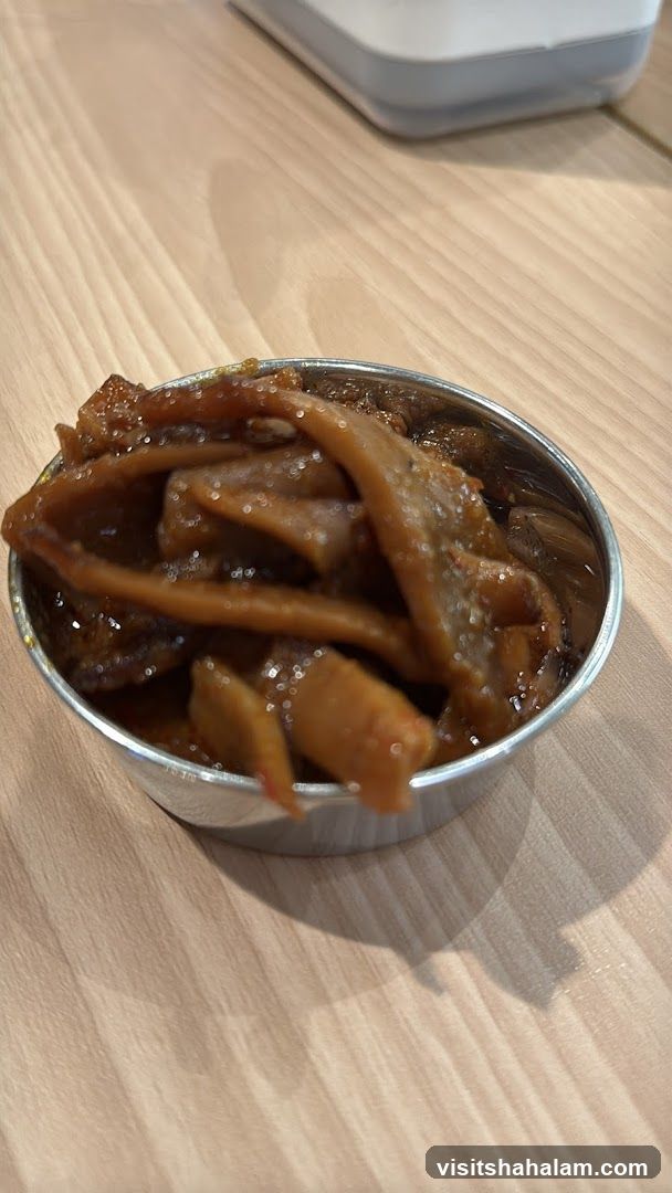 Small bowl of braised food