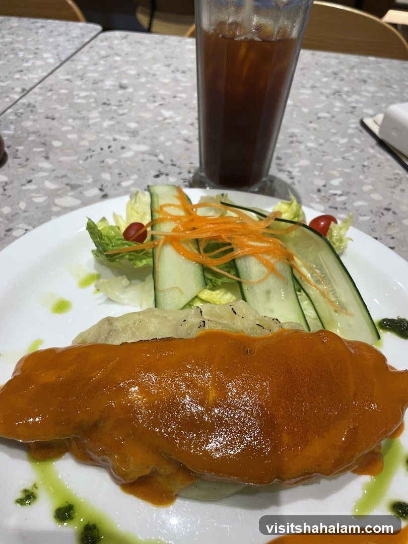 Fish dish with salad and iced tea