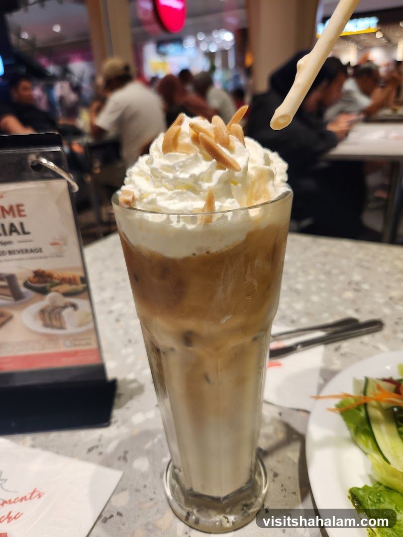 Iced Coffee with Whipped Cream and Almonds