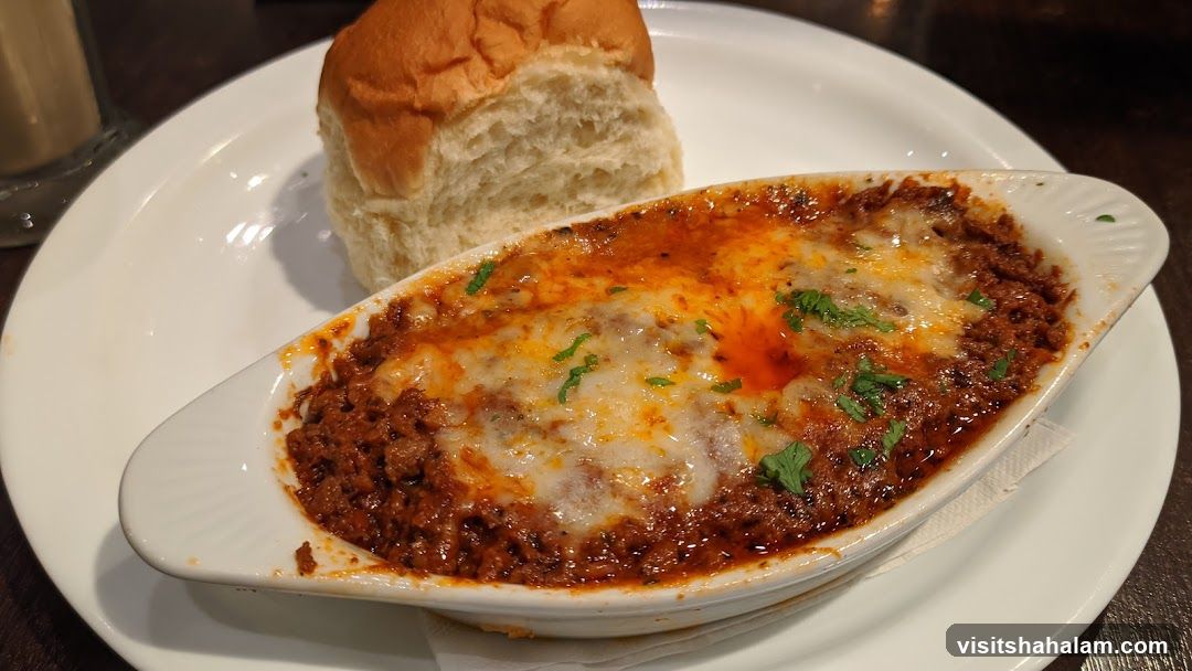 Cheesy Meat Dish with Bread Roll