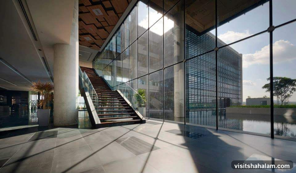 Modern Interior with Staircase and Glass Facade