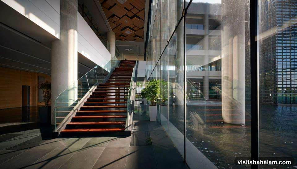 Modern Interior with Staircase and Water Feature