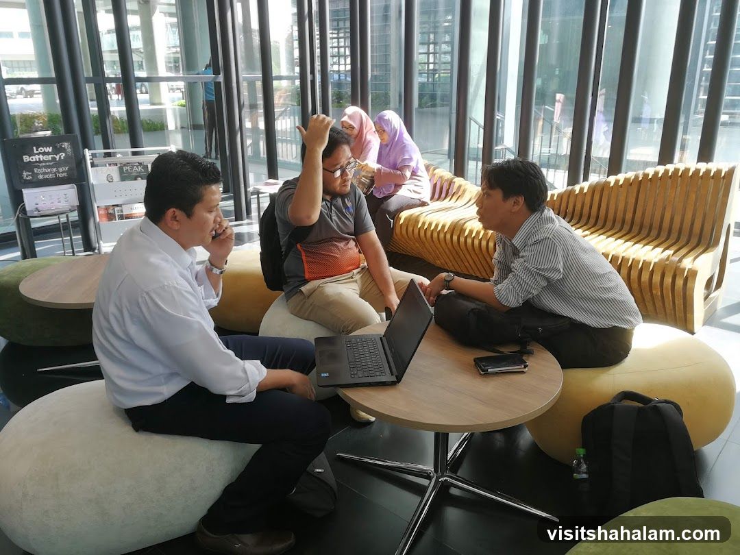 People in a modern lounge area