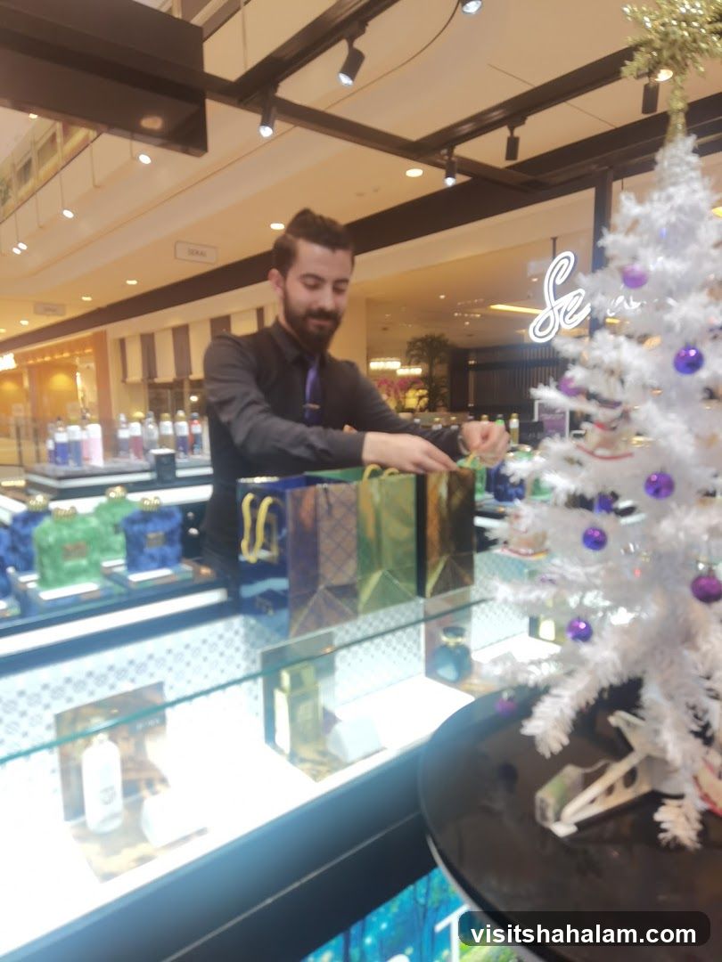 Sales associate wrapping gifts