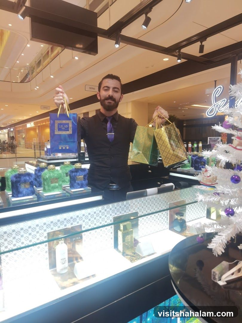 Sales Associate Holding Shopping Bags