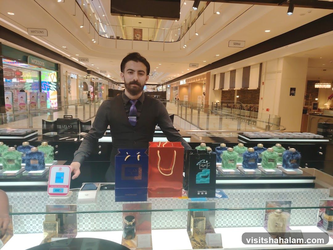 Perfume display with staff