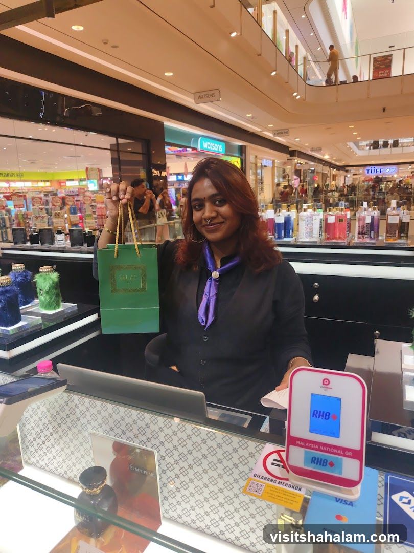 Sales associate holding a shopping bag