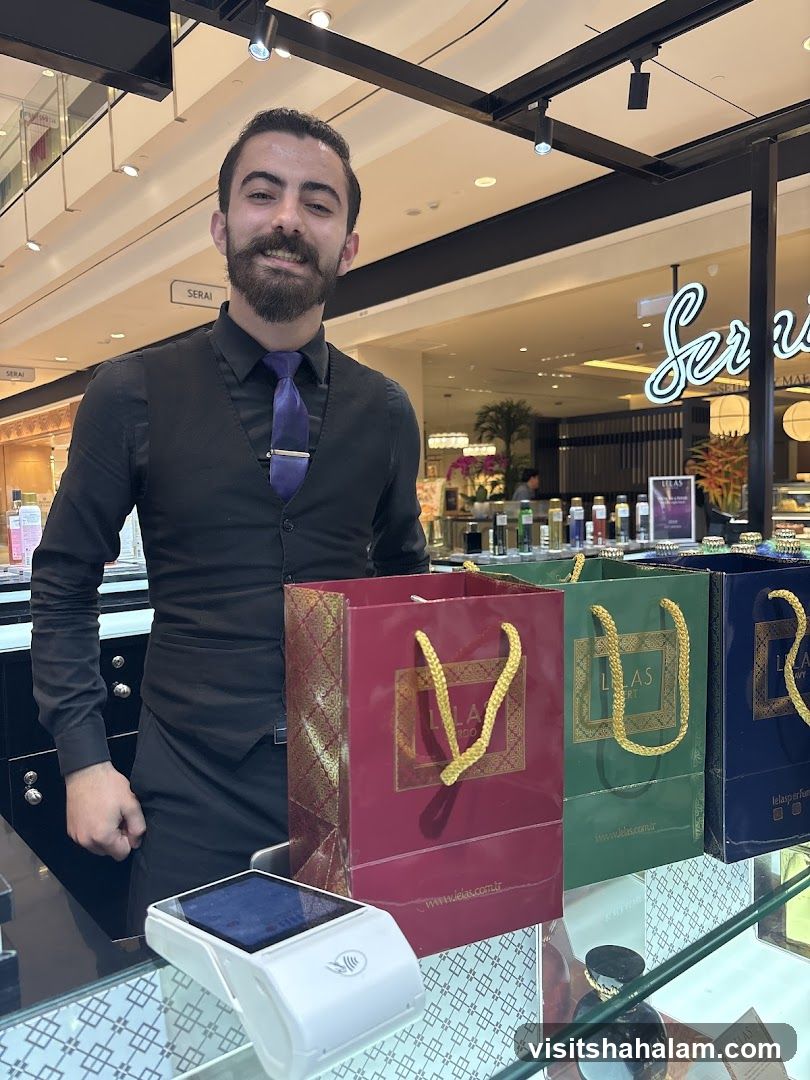 Sales associate with shopping bags