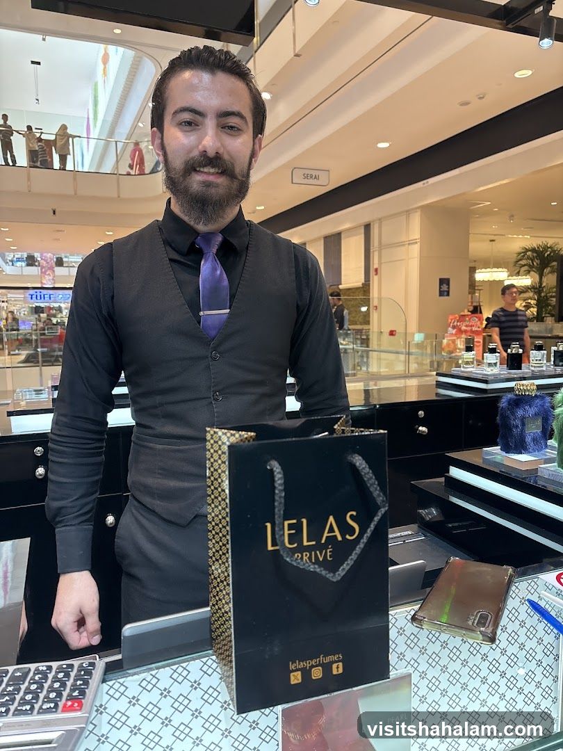 Sales Associate with Shopping Bag