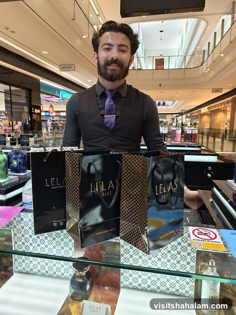 Perfume display with staff
