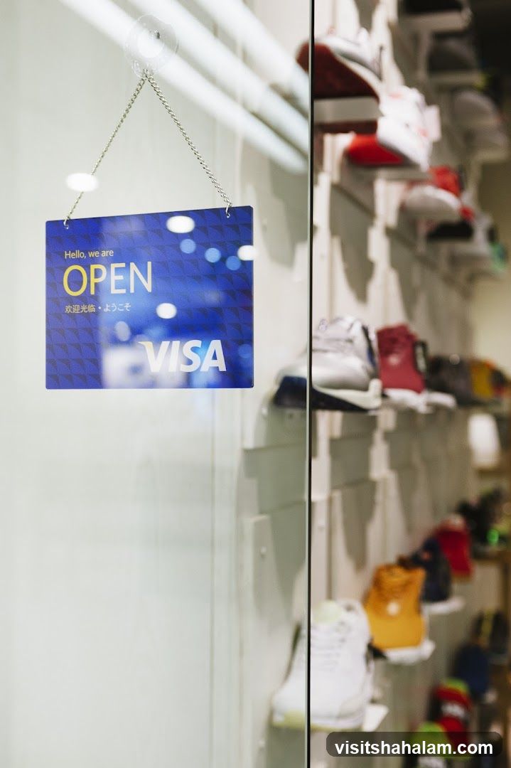 Open sign and shoes on display