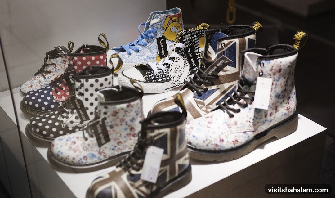 Assortment of Patterned Boots and Sneakers