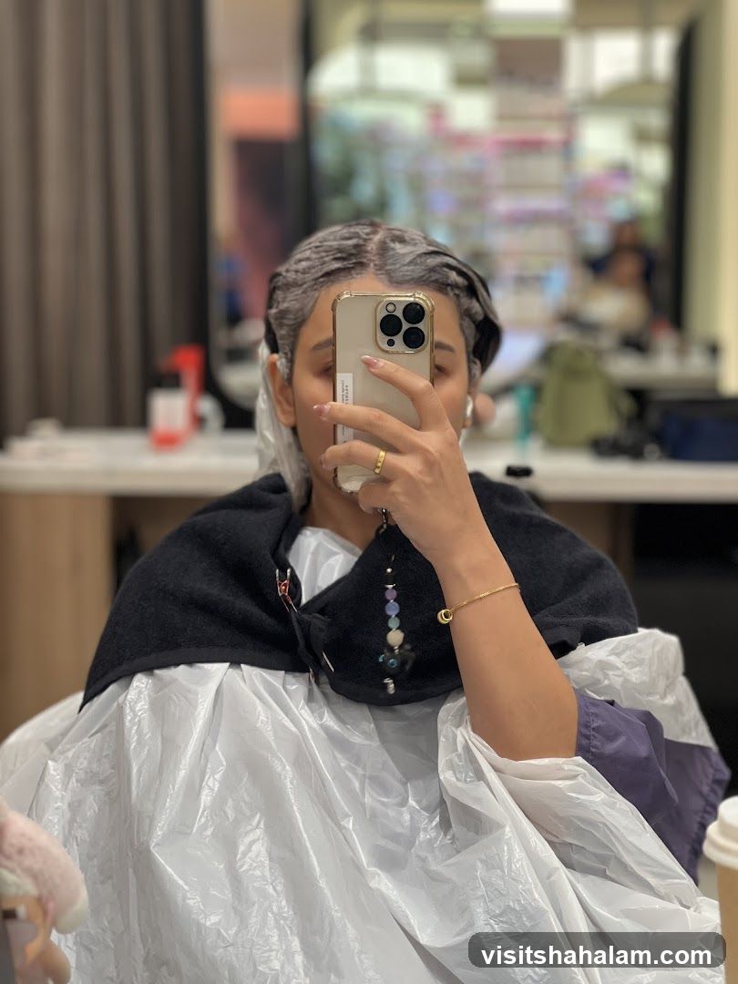 Woman getting hair dyed