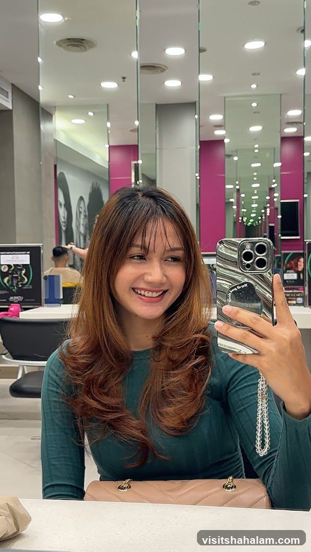 Woman taking a selfie in a salon