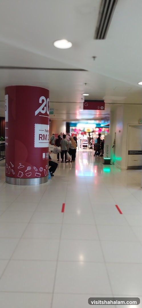 Shopping Mall Interior with Promotional Pillar
