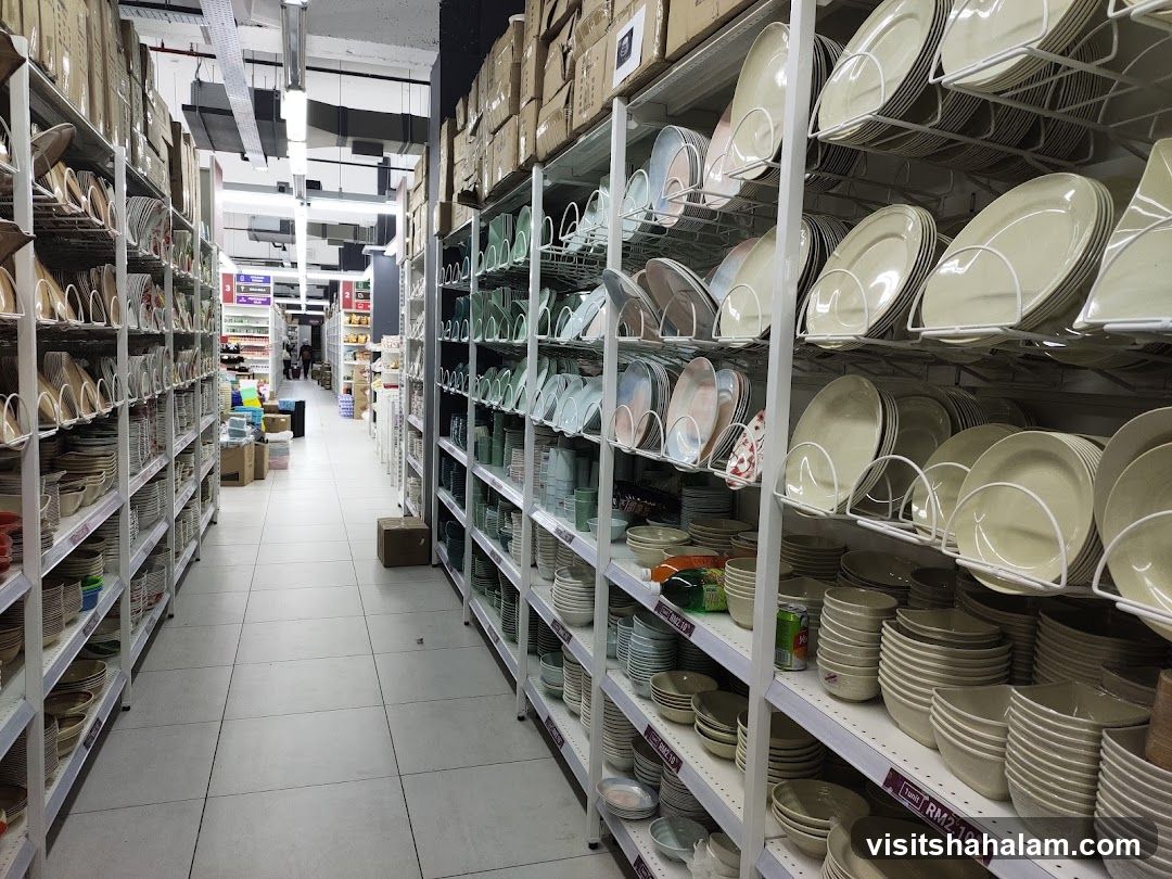 Store aisle with shelves of dinnerware