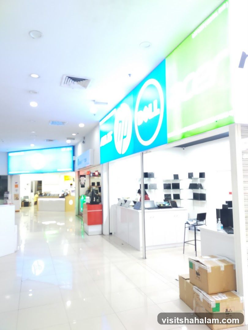 Computer store interior with brand signage