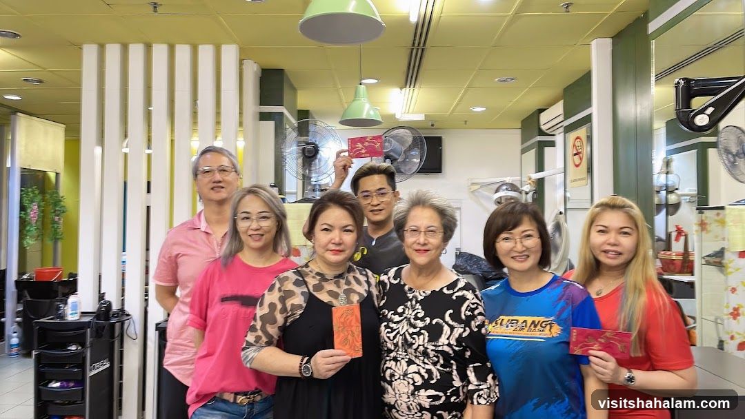 Group of people holding red envelopes