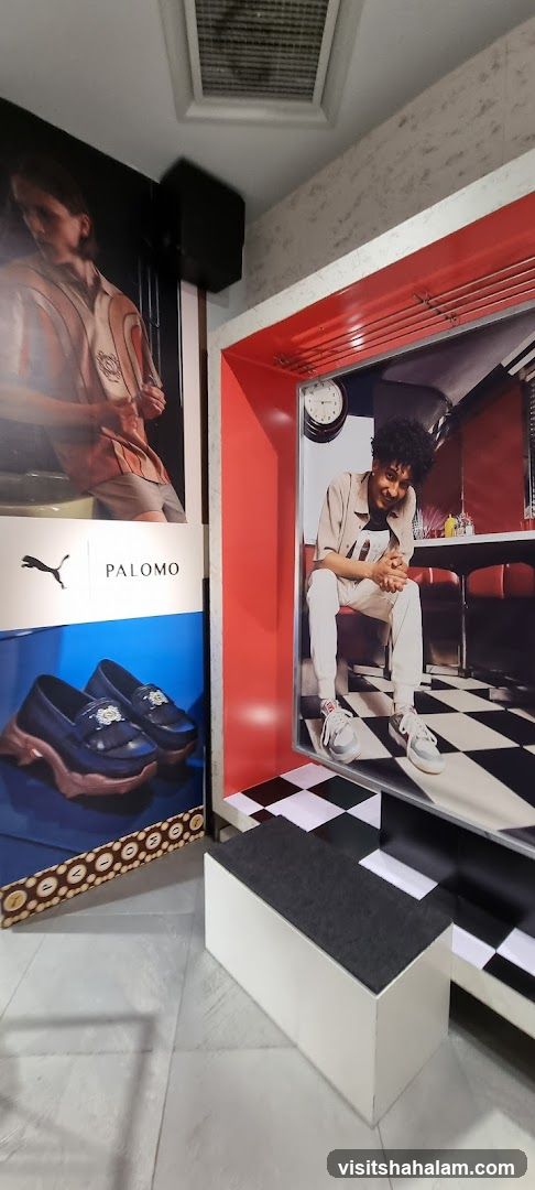 Fashion Display with Puma and Palomo Branding