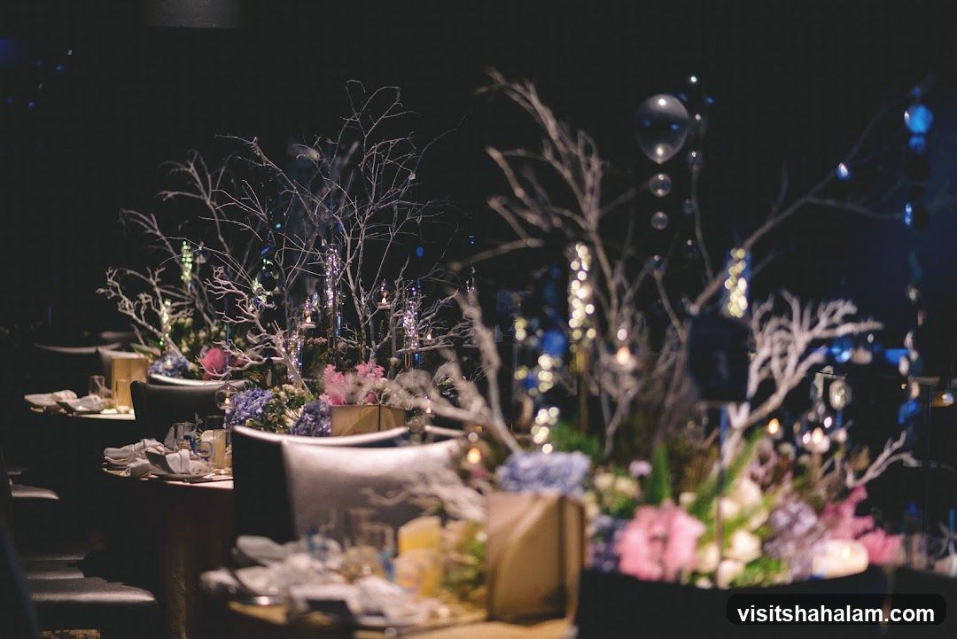 Elegant Table Setting with Floral and Branch Centerpieces