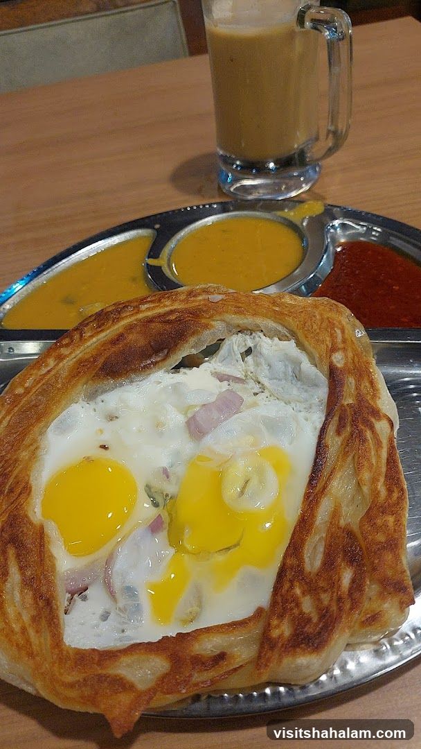 Roti Canai with Eggs and Curry