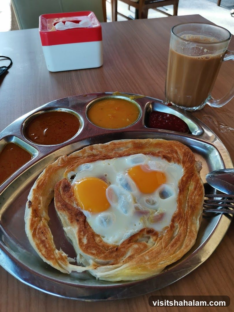 Roti Canai with Eggs and Curry