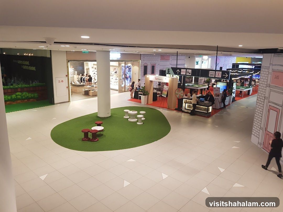 Indoor shopping mall with various stalls and shops