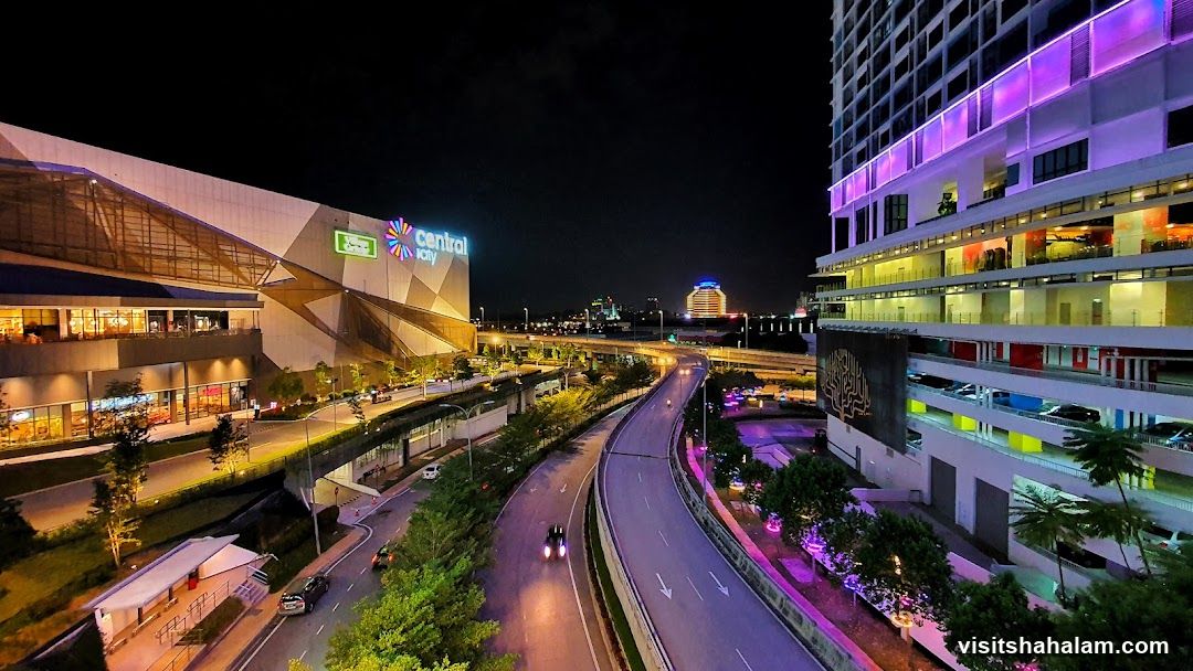 Cityscape at Night with Shopping Mall