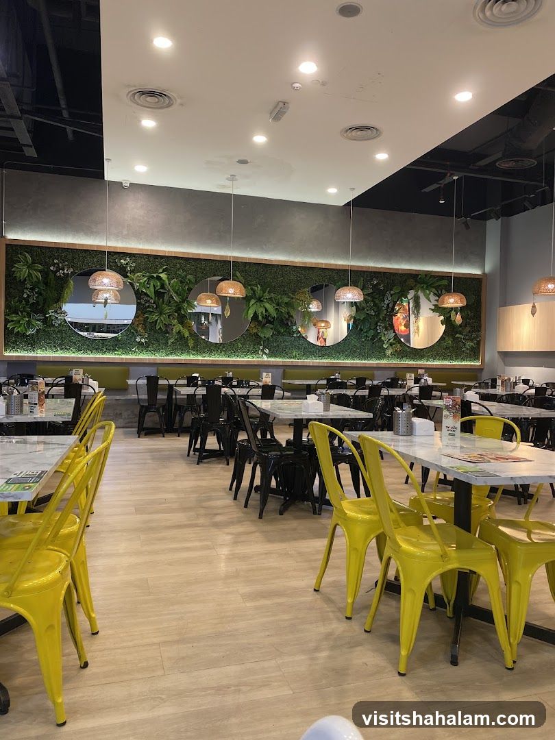 Restaurant Interior with Greenery and Yellow Chairs