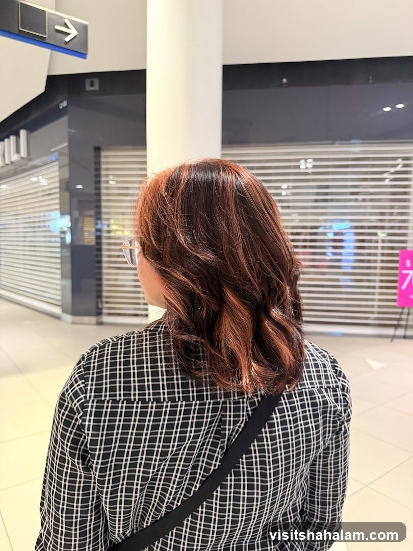 Woman with Reddish-Brown Hair in Mall