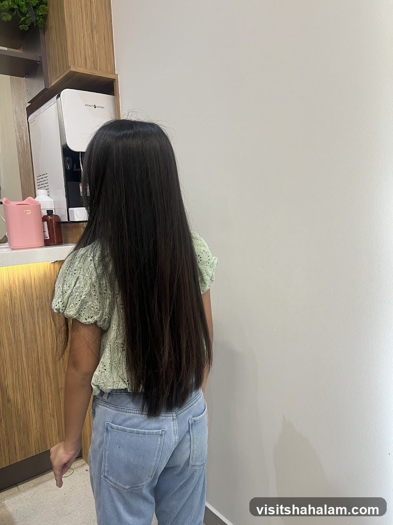 Girl with long hair in a salon