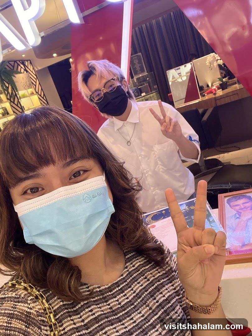Two people posing for a selfie
