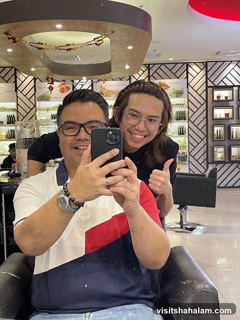 Two men taking a selfie in a salon