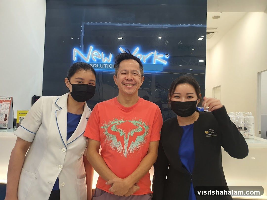 Three people posing for a photo