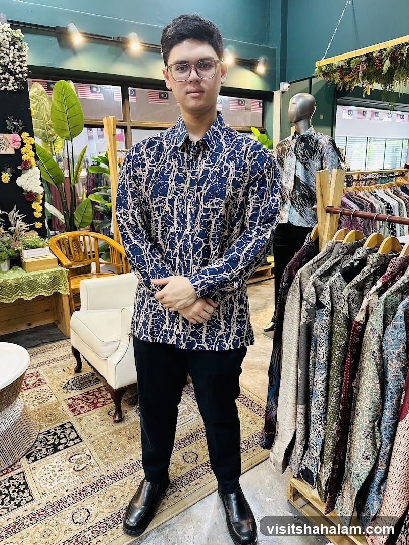 Man in Batik Shirt in Store