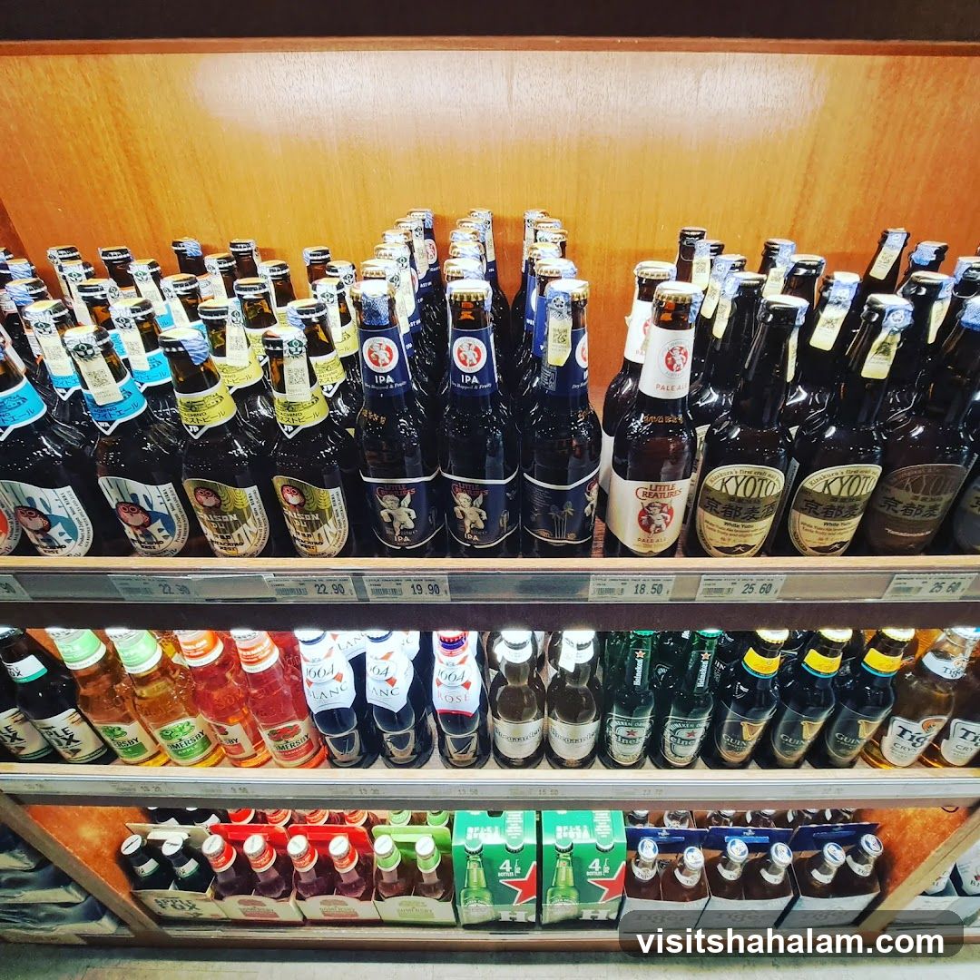 Bottles of Beer on Shelves