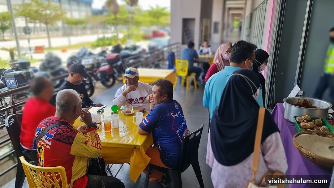 Outdoor dining area with people and food