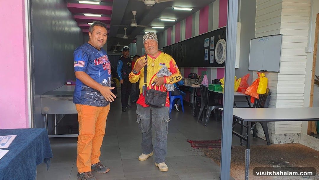 Two men standing in a shop