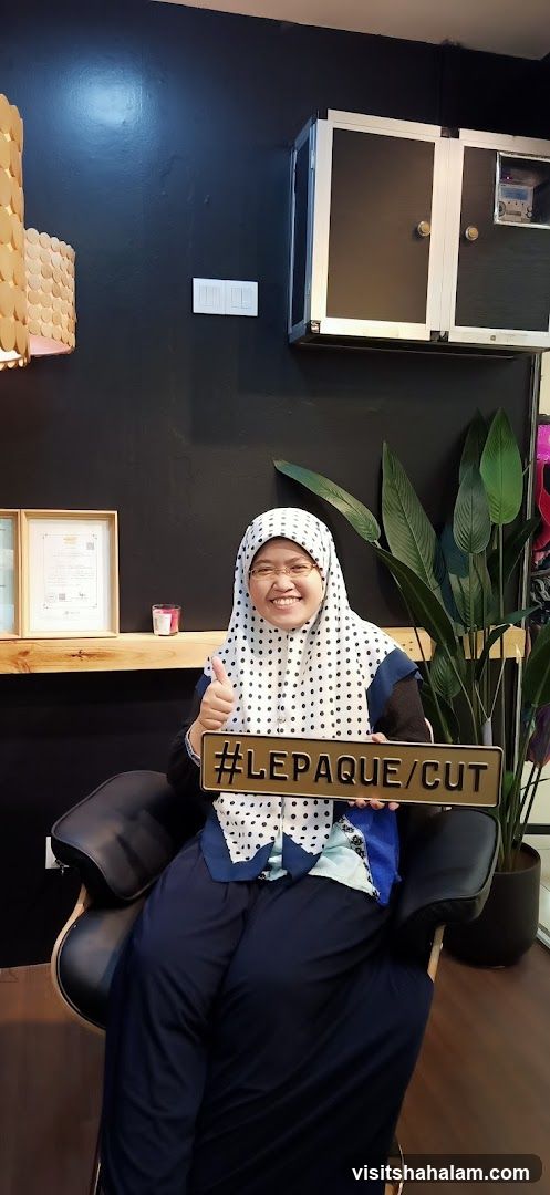 Woman holding a sign