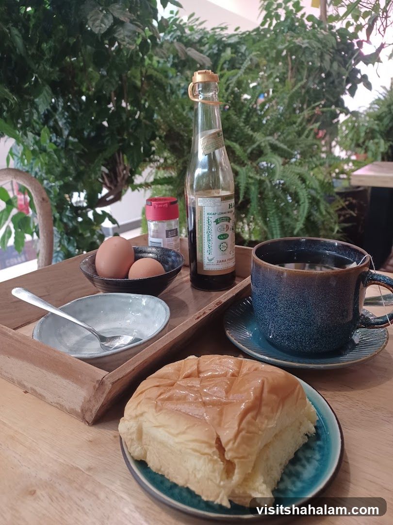 Breakfast Tray with Eggs, Bread, and Tea
