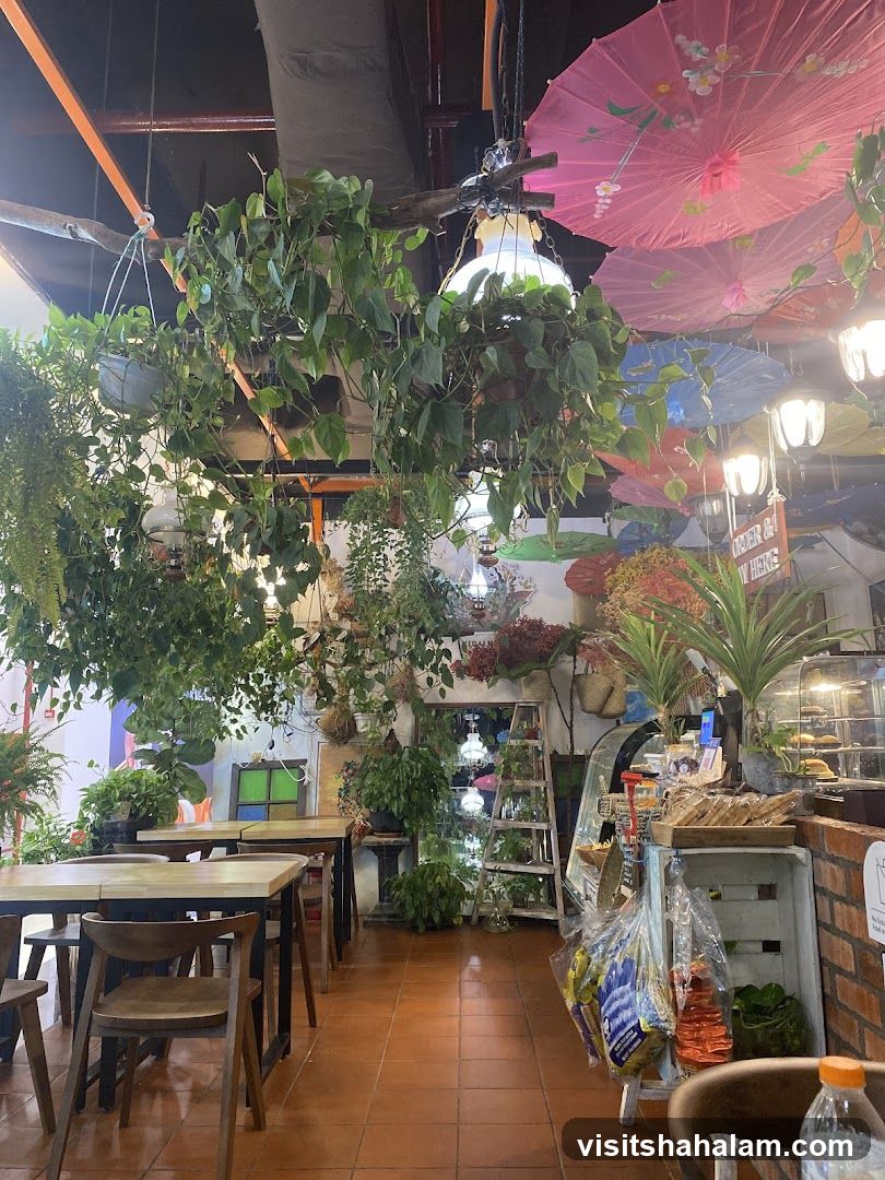 Cafe Interior with Hanging Plants and Umbrellas