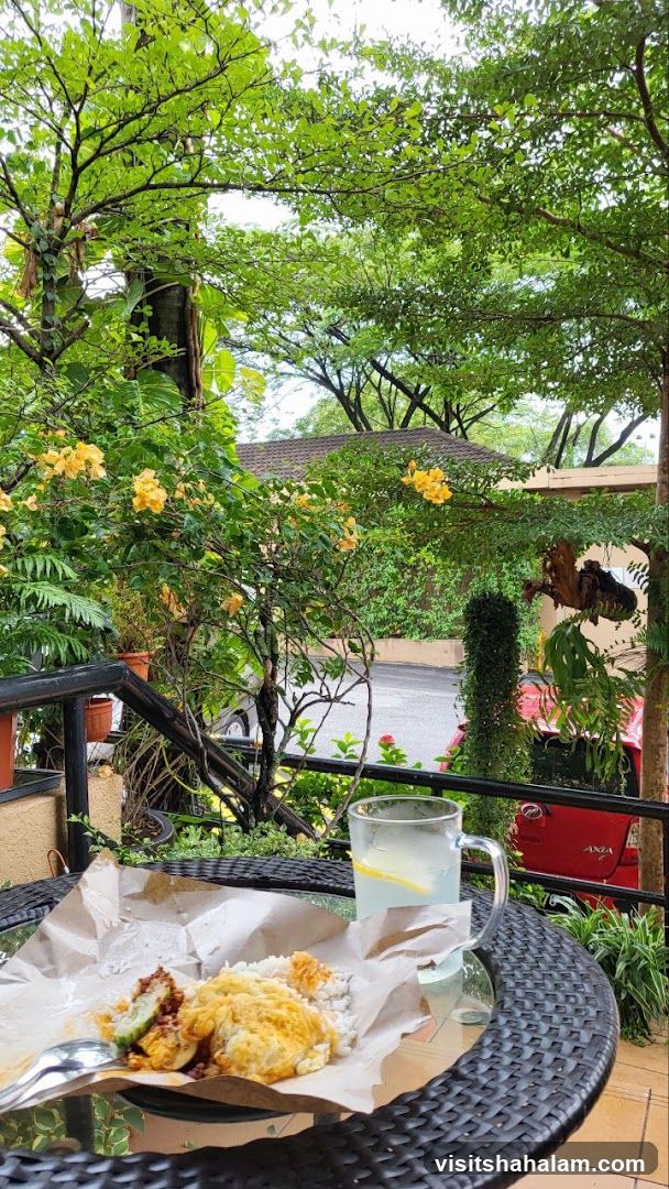 Outdoor dining with a meal and drink